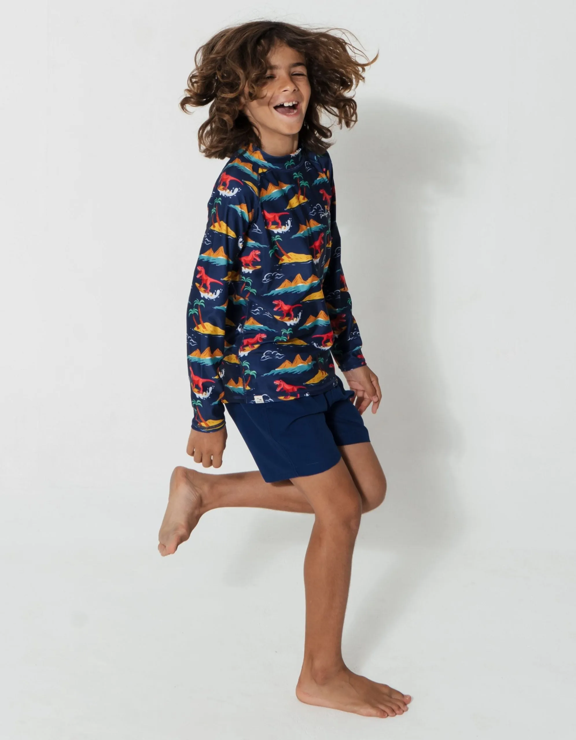 Surfing Dinosaur Rash Guard